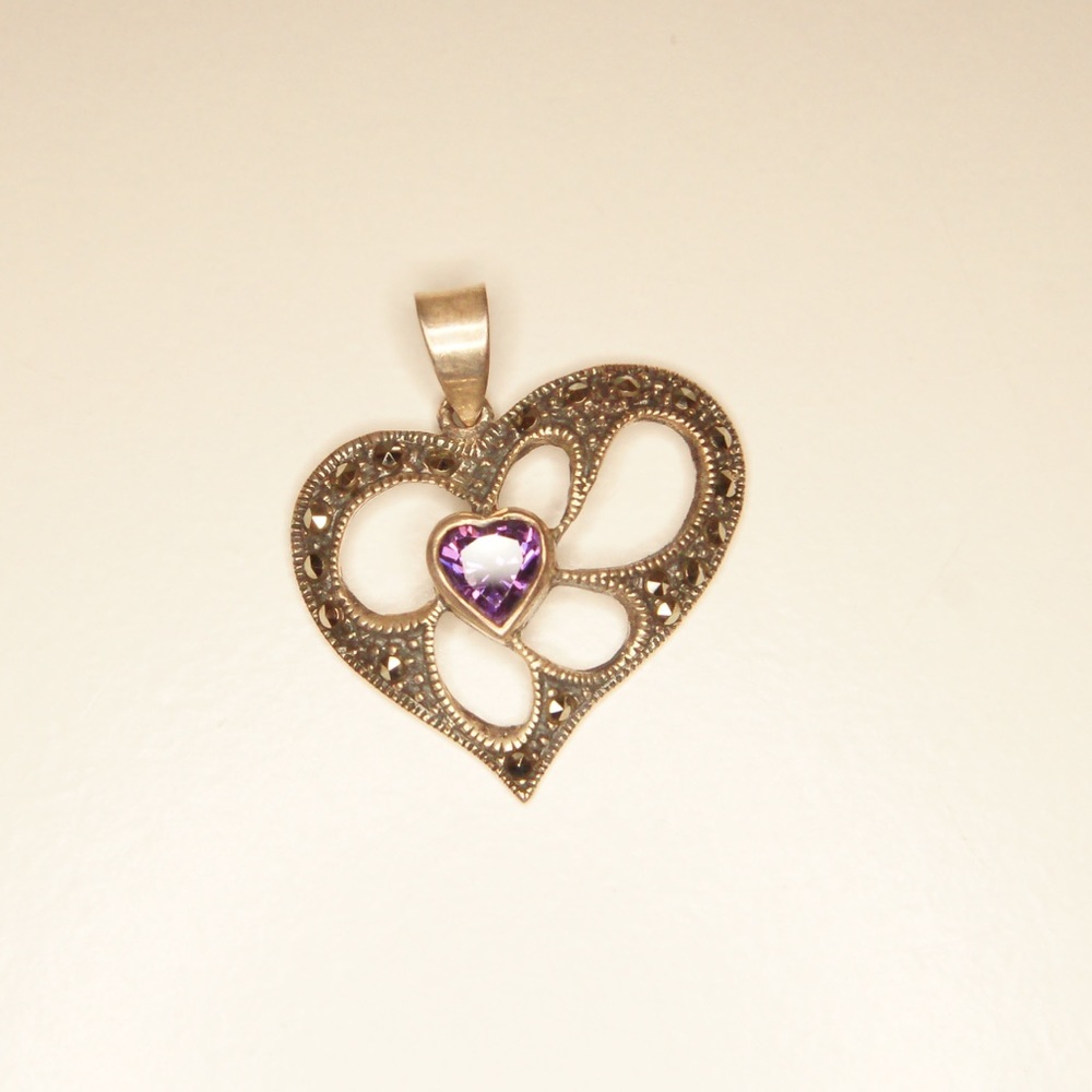 Sterling silver asymmetrical heart pendant